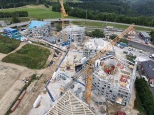 Concours_architecte-paysagiste_logments_Vallorbe_Le_Day_Rivieira_Vaudoise_Alpes_lac Léman_best_view_construction_parc_urbain_Aire_de_jeux_3_prix_arbres_piscine_parking_grilles_gazon_bâtiment_lands&urban_architecture_meilleur_architecte_Architecture_durable_écologie_développement_durable_Commune